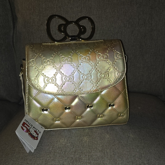 Hello Kitty Handbags - NWT Sanrio Hello Kitty 50th Anniversary Metallic Gold Crossbody Bag